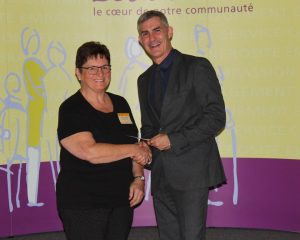 Maggie Patterson receiving award